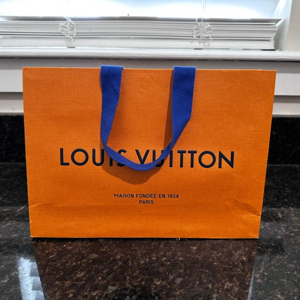 Louis Vuitton Bold Orange Bag with Blue Accents